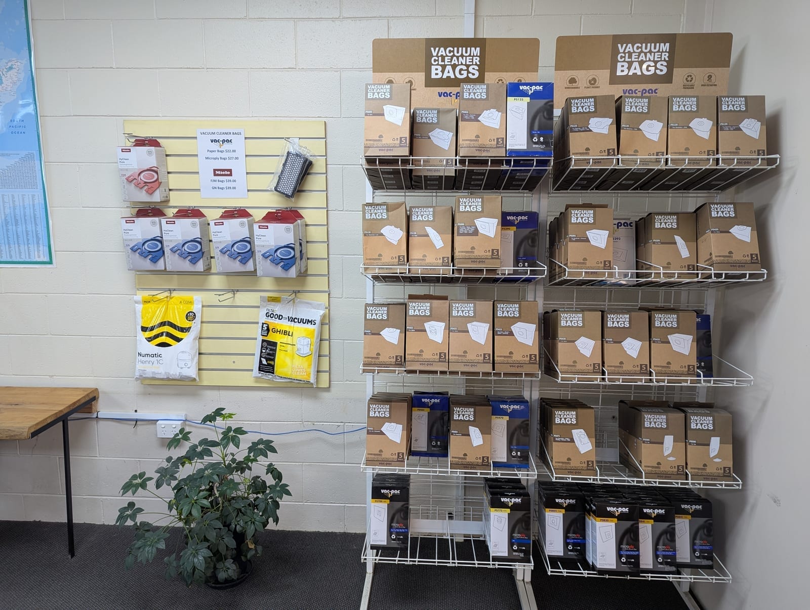 Vacuum cleaner bags and filters on display at Unlimited Copies Takaka, including vac-pac and Miele